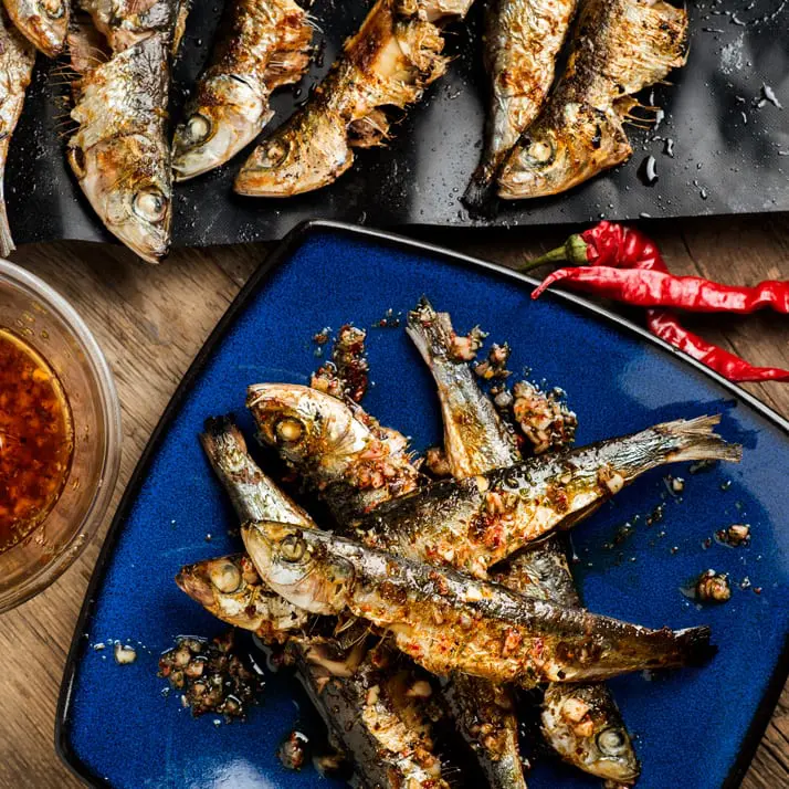 grilled-sardines-dress-with-olive-oil-hot-peppers-garlic-and-oregano
